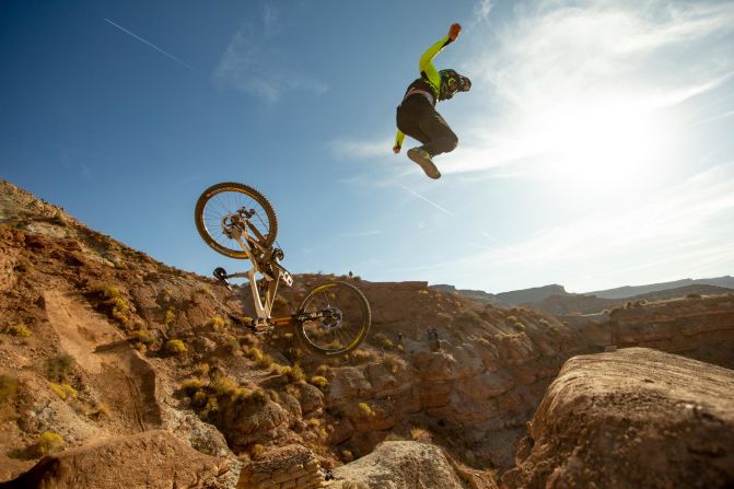 Freeride mountain bike rider Cameron Zink crashes Thursday, October 24, while practicing for the Red Bull Rampage event in Virgin, Utah.