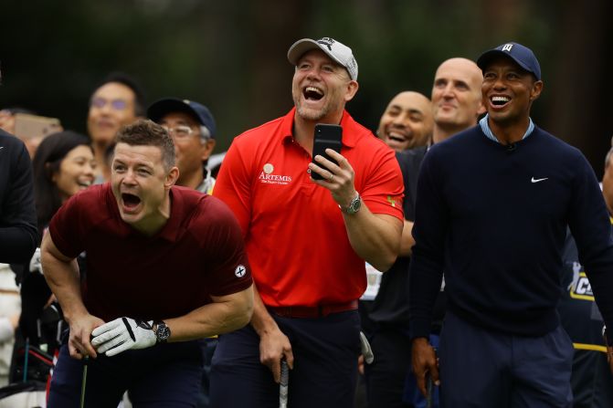 Tiger Woods, right, and former rugby players Brian O'Driscoll, left, and Mike Tindall watch a tee shot by Bryan Habana during a Skins competition in Inzai, Japan, on Monday, October 21.