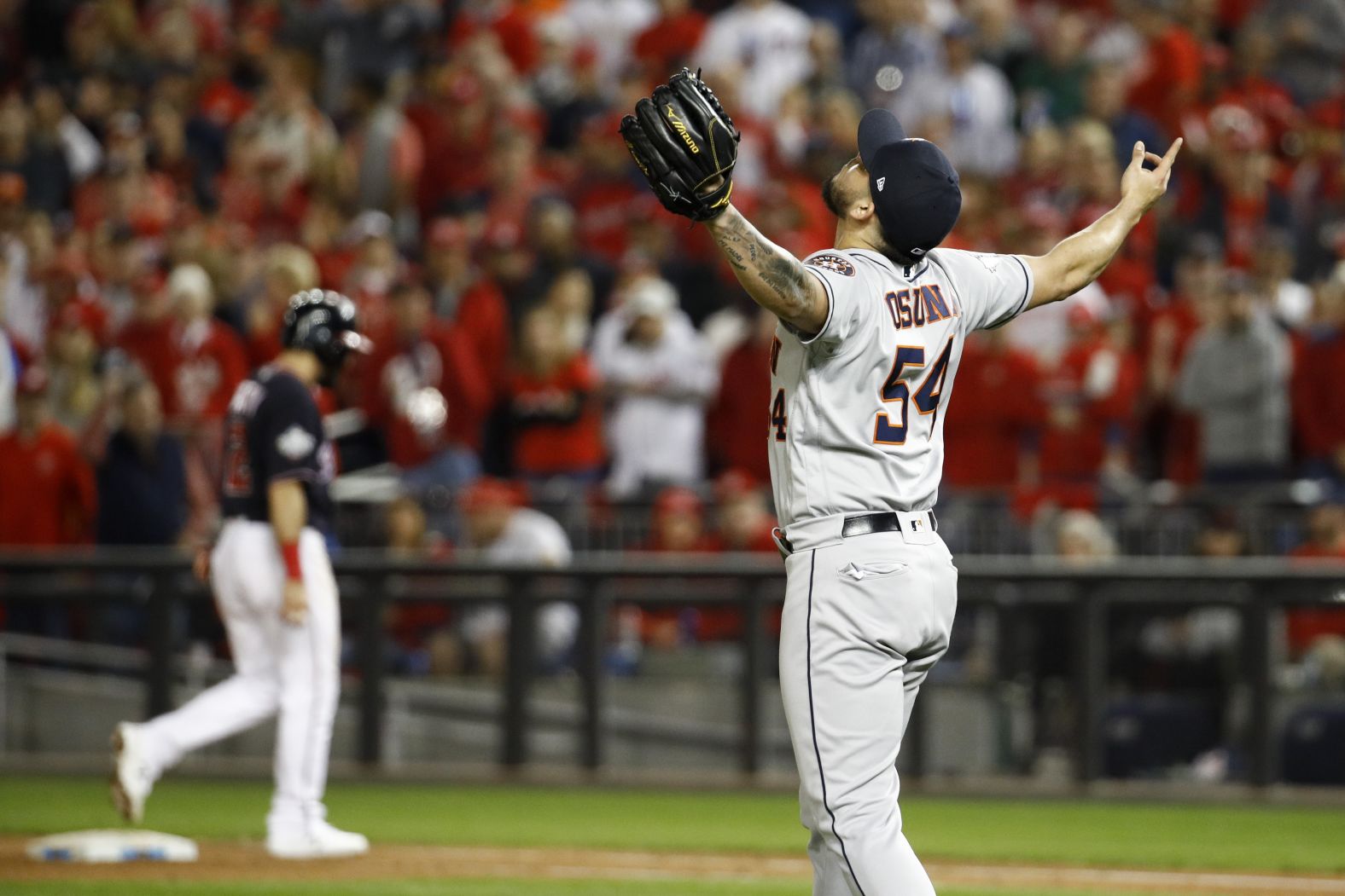 Houston closer Roberto Osuna celebrates after getting the final out in the Astros' 4-1 victory in Game 3.