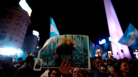 Supporters of Argentina's presidential candidate for the Frente de Todos party Alberto Fernandez celebrate his win in the general elections at Obelisco in Buenos Aires on October 27, 2019.