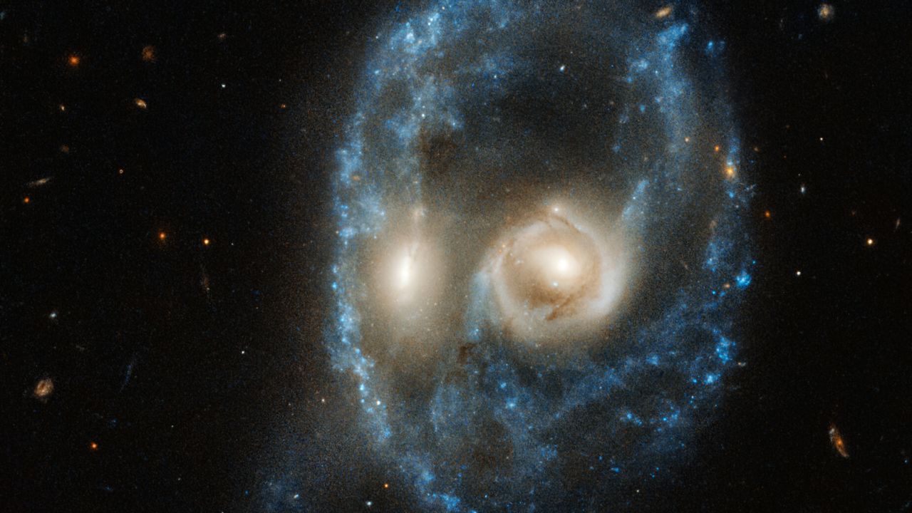 This new image from the NASA/ESA Hubble Space Telescope captures two galaxies of equal size in a collision that appears to resemble a ghostly face.