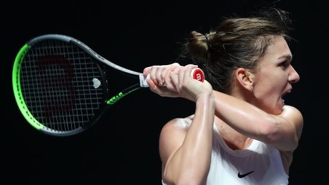 Simona Halep beat Bianca Andreescu in three sets at the WTA Finals on Monday.