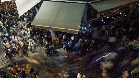 Revelers dressed in costume gather at Lan Kwai Fong on Halloween 2015.