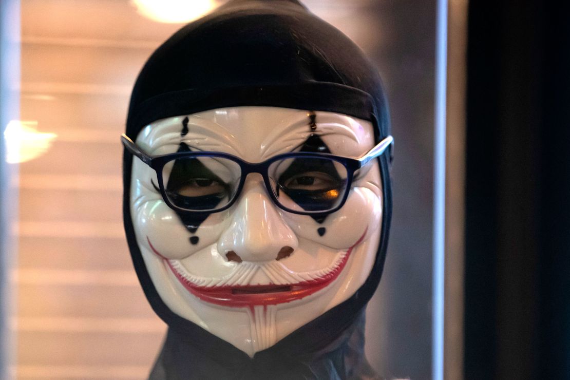 A protester wears a clown mask in Hong Kong on October 18, 2019.