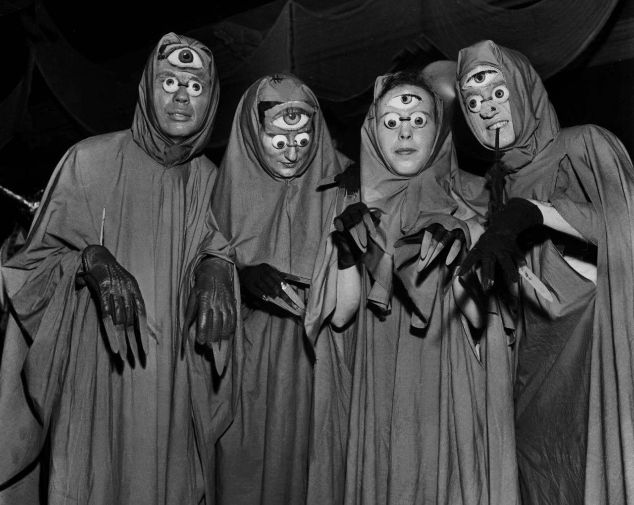 Portrait of party goers at the Chicago Art Institute's Halloween Ball, Chicago, Illinois, 1949.