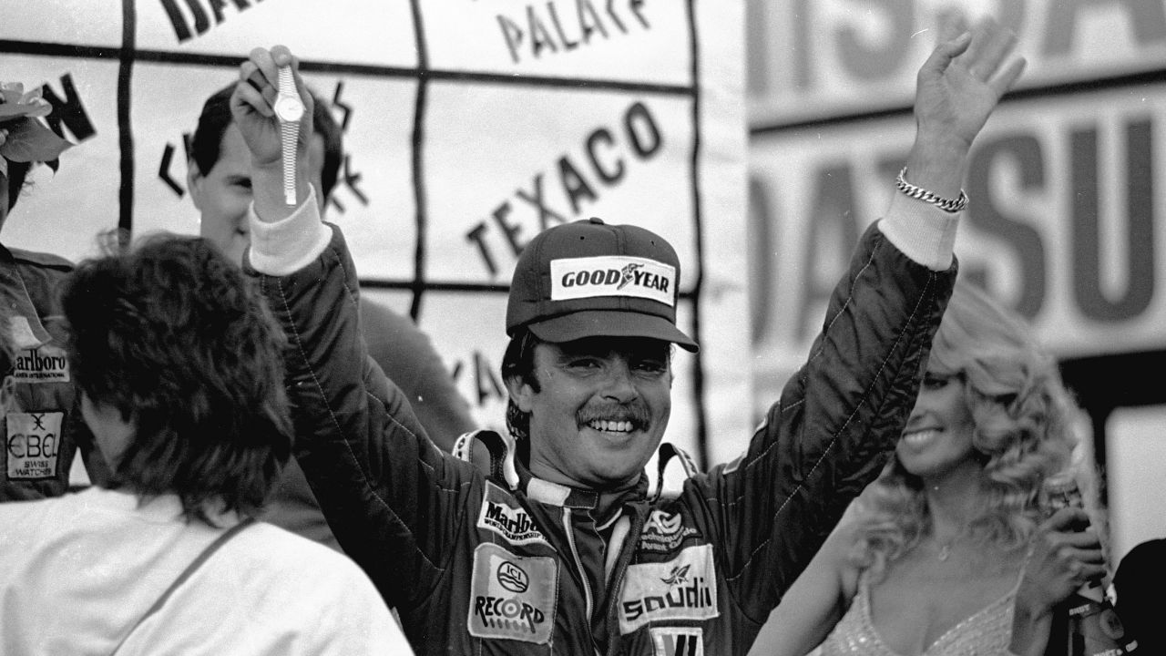 Keke Rosberg celebrates his fifth place finish at the 1982 Caesars Palace Grand Prix that secured him the world championship.