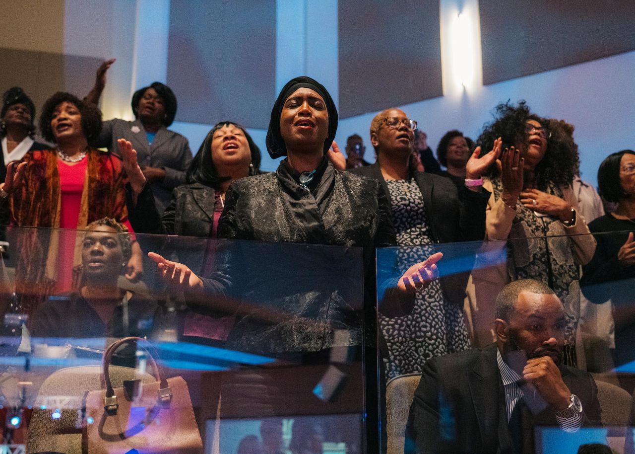 People attend the funeral service in Baltimore.