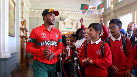 Schoolchildren in the Pavilion at Lord's with Bangladesh's Shakib Al Hasan on July 5, 2019 in London.