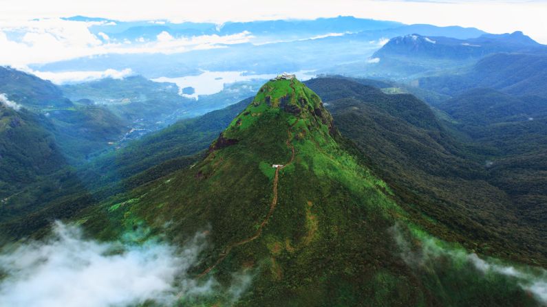 <strong>Sacred mountain: </strong>Standing at 2,243 meter high, Adam's Peak  is a holy site for Buddhists, Muslims, Hindus and Christians.<br />