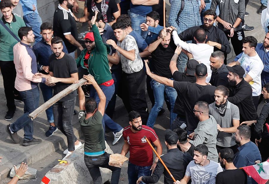 Protesters and counter-protesters face off near the government palace on October 25.