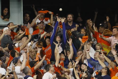 Fans try to catch Bregman's home run in Game 6.