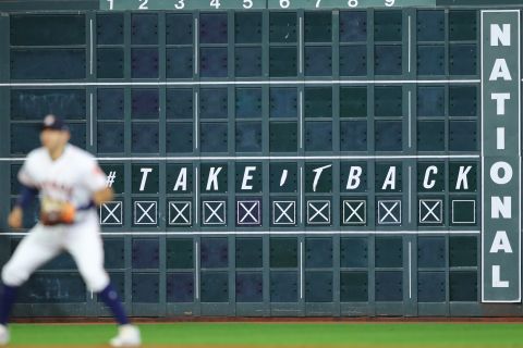 A scoreboard in Houston shows the Astros one win away from the title.
