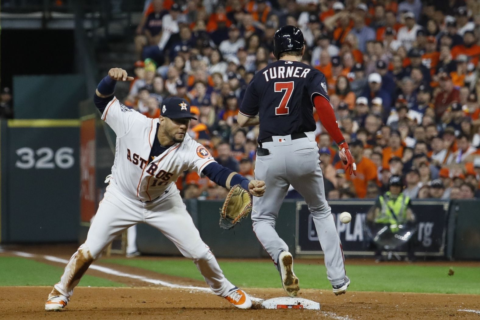 The controversial play came as Turner was running to first to beat a groundout. Houston first baseman Yuli Gurriel lost his glove and was unable to make the catch. The umpire said Turner interfered with Gurriel. The Nationals were irate.