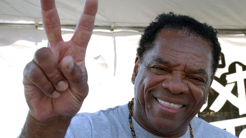 John Witherspoon looks on as Los Angeles Street Ballers compete for the chance to play against the 2004 Team AND1 on the blacktop of the The Great Western Fourm in Inglewood, California June 9, 2004. (Photo by Steve Grayson/WireImage)