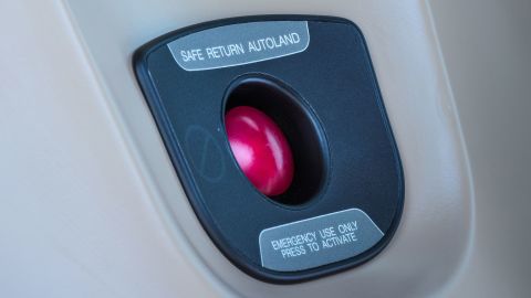 Any occupant could press this red button and the plane would make an emergency landing on its own, Cirrus said.