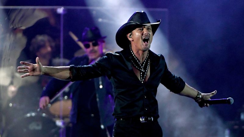 NextImg:Tim McGraw speaks out on concertgoers throwing things at shows: 'It's terrible' | CNN