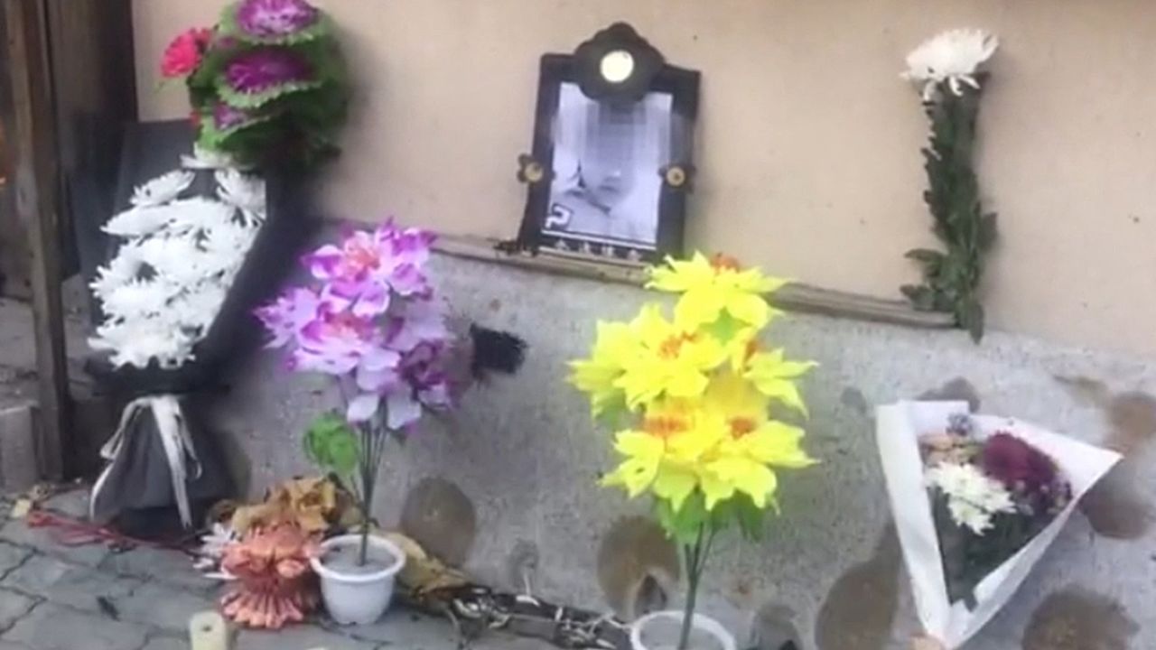 A shrine to the 10-year-old girl allegedly murdered on October 20 by a 13-year-old boy in Dalian, Liaoning province, taken from a video published by state-run media Beijing News. The broadcaster blurred the victim's face due to her age.