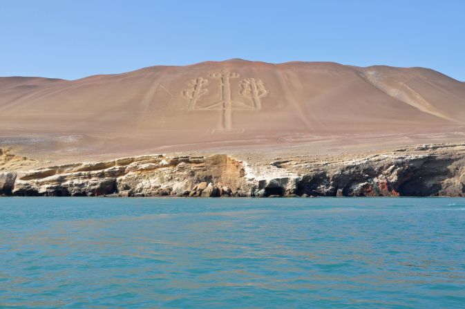 <strong>El Candelabro:</strong> Nearly 600 feet tall, the candelabra-like geoglyph etched into a cliff face is believed to date back to 200 BC but its origins and purpose remain a mystery.