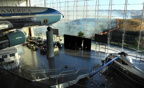 An Air Force One from Ronald Reagan's presidency sits on display as the Easy Fire burns near Reagan's presidential library on October 30.