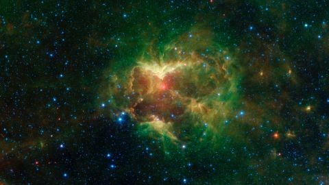 Spitzer captured the nebula in different wavelengths of light.