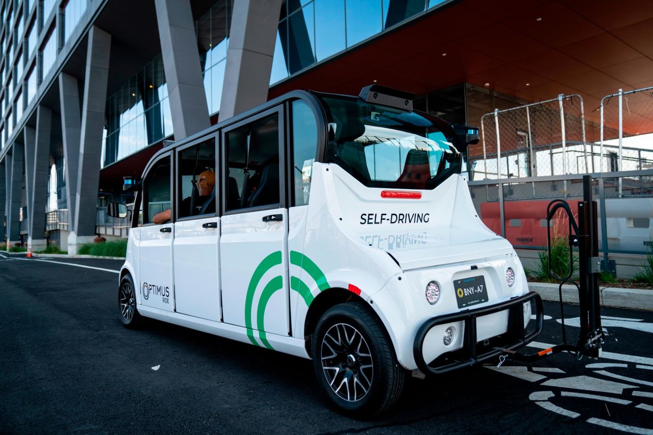 The Optimus Ride autonomous six-seater shuttle bus drives through the Brooklyn Navy Yard in New York City. <br />