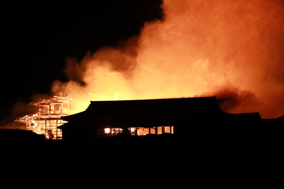 The main building of the Shuri Castle is seen on fire in Naha, Okinawa prefecture, southern Japan, early 31 October 2019.