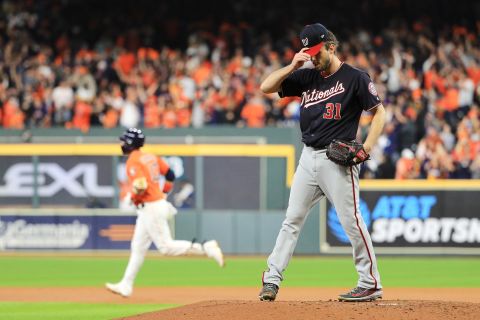 Washington starter Max Scherzer reacts after allowing a solo home run to Yuli Gurriel in the second inning of Game 7.