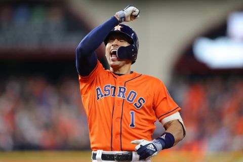 Correa celebrates his RBI single that gave the Astros a 2-0 lead in Game 7.