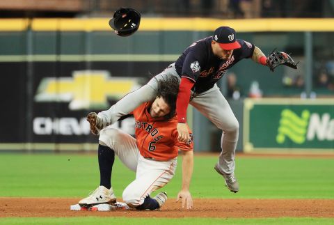 Washington second baseman Asdrubal Cabrera collides with Jake Marisnick as he turns a double play in Game 7.