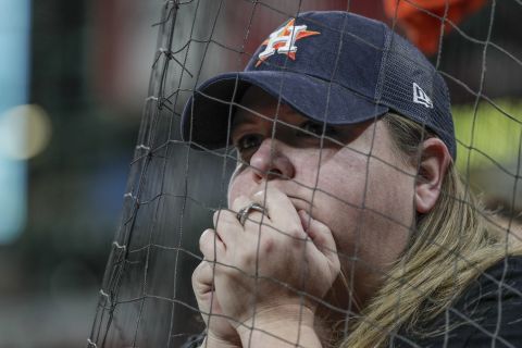 An Astros fan watches as her team trailed in the eighth inning. The home team lost all seven games of the series.