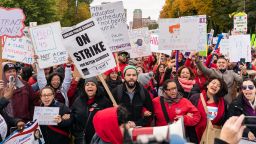 Striking teachers, school staff, and supporters march through downtown Chicago on the ninth day of the Chicago Teachers Union strike on October 25, 2019. (Photo by Max Herman/NurPhoto via Getty Images)