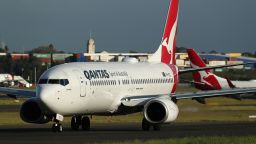 A Boeing Co. 737-800 aircraft operated by Qantas Airways Ltd. taxies at Sydney Airport in Sydney, Australia, on Tuesday, Feb. 20, 2018. Qantas reports first-half results on Feb. 22 and has said profit may rise as much as 12 percent. Photographer: Brendon Thorne/Bloomberg via Getty Images