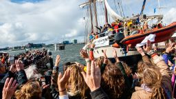 The group of climate activists are seen saying goodbye from the boat just departing where they are going to be sailing to COP25 in Chile. Amsterdam, October 2nd, 2019. 