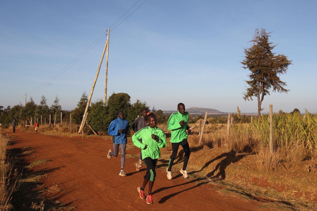 Mary Keitany (front left) trains with her husband and coach Charles Koech (front right) in Iten, Kenya. 