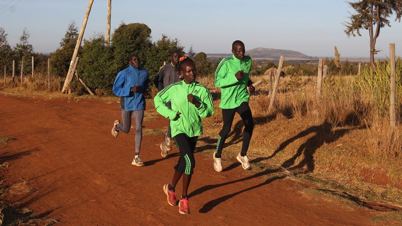 Mary Keitany (front left) trains her husband and coach Charles Koech (front right) in Iten, Kenya.
