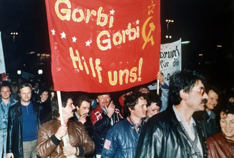 Protesters carry a banner reading "Gorbi Gorbi help us!" during a visit to East Germany by Mikhail Gorbachev -- then leader of the Soviet Union -- in October 1989.  