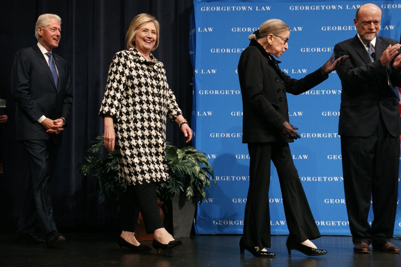 Former President Bill Clinton and former Secretary of State Hillary Clinton follow Supreme Court Justice Ruth Bader Ginsburg before <a href="https://www.cnn.com/2019/10/30/politics/hillary-clinton-ruth-bader-ginsburg-supreme-court-pick/index.html" target="_blank">speaking at Georgetown Law's second annual Ruth Bader Ginsburg Lecture</a> on Wednesday, October 30. At right is William Treanor, dean of the law school in Washington.