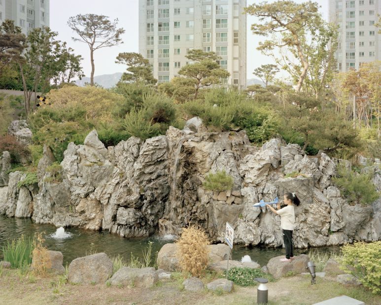 A beautification trend known as "jingeyong sansu" seeks to recreate the country's most famous mountains -- on a much smaller scale -- outside luxury apartment complexes and private villas.