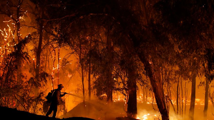 A firefighter battles the Maria Fire Thursday, Oct. 31 2019, in Somis, Calif. (AP Photo/Marcio Jose Sanchez)