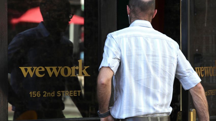 SAN FRANCISCO, CALIFORNIA - OCTOBER 07: A man enters a WeWork office on October 07, 2019 in San Francisco, California. Days after withdrawing its registration for an initial public offering, WeWork also warned employees that the company could be set to lay off nearly 2,000 people, about 16 percent of its workforce. (Photo by Justin Sullivan/Getty Images)