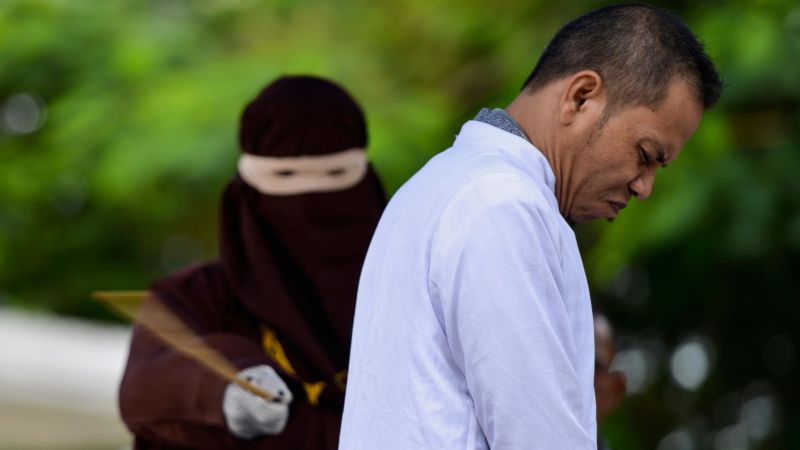 Man who helped create caning law gets caned