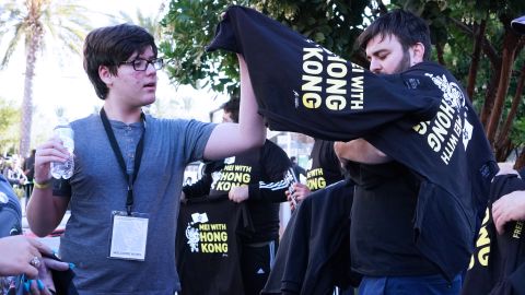 Protesters hand out free shirts outside BlizzCon, in Anaheim, California, on Friday.