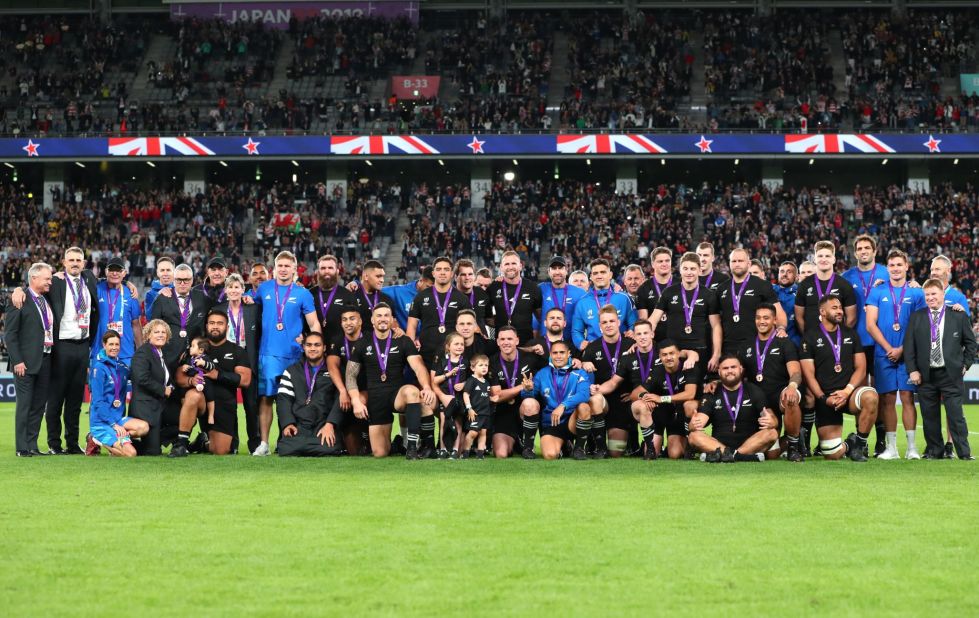 The All Blacks celebrate their bronze medal success.