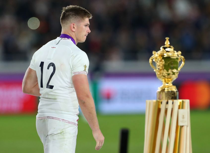 Owen Farrell of England walks past the Web Ellis trophy. South Africa were deserved victors, winning 32-12.