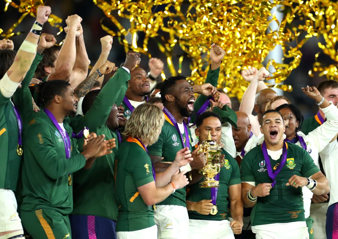 Siya Kolisi of South Africa lifts the Rugby World Cup trophy after his side's win against England.