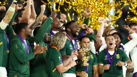 Siya Kolisi of South Africa lifts the Rugby World Cup trophy after his side's win against England.