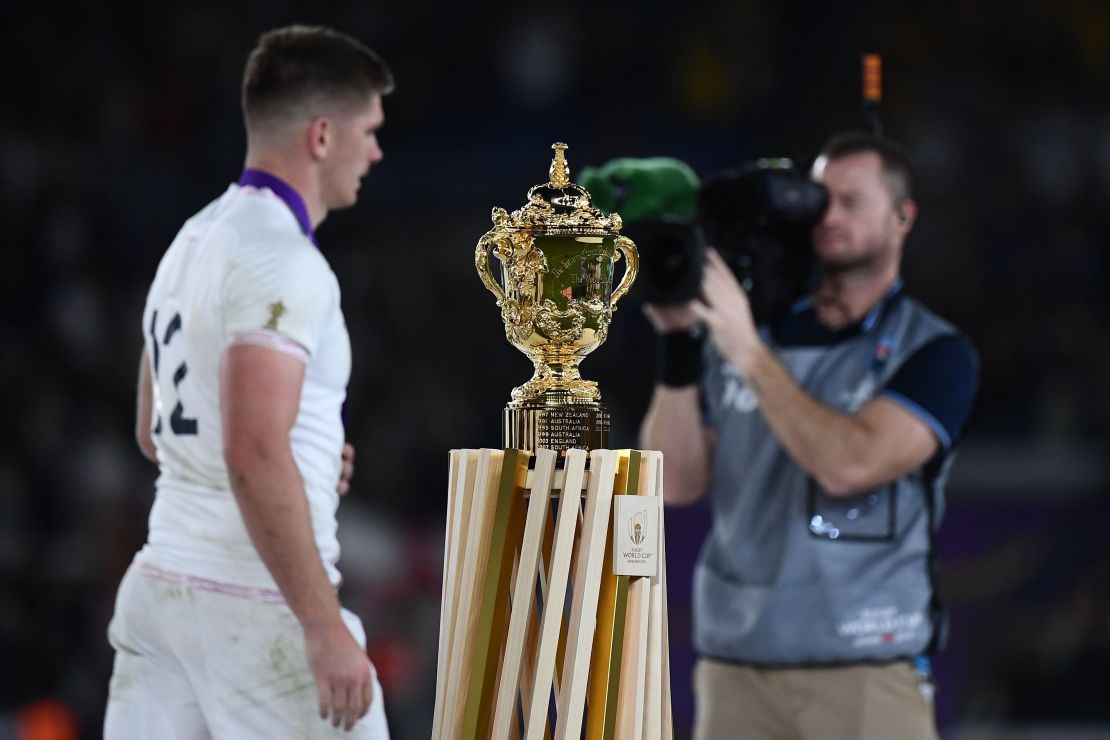 England's centre Owen Farrell walks past the World Cup trophy after losing the 2019 Rugby World Cup final.