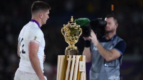 England's centre Owen Farrell walks past the World Cup trophy after losing the 2019 Rugby World Cup final.