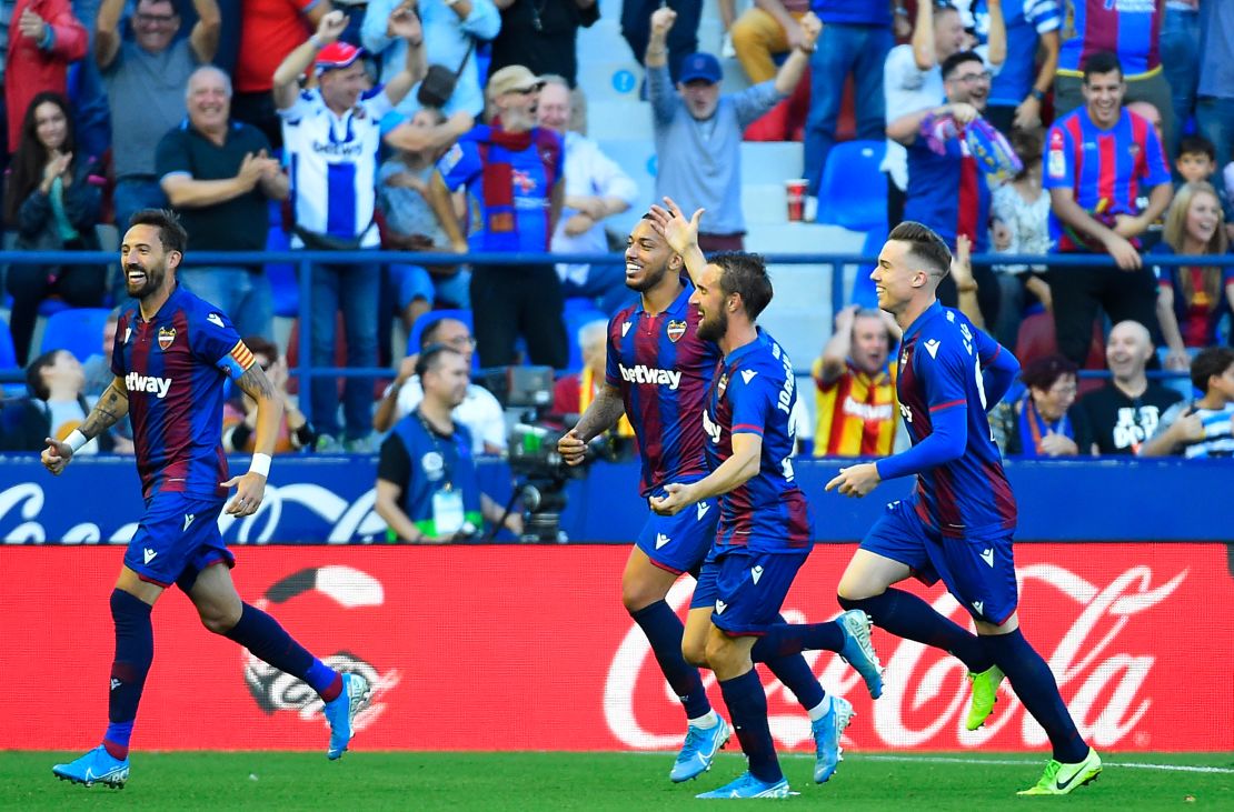 Levante's players celebrate the third goal scored by Nemanja Radoja in the 3-1 victory over Barcelona.