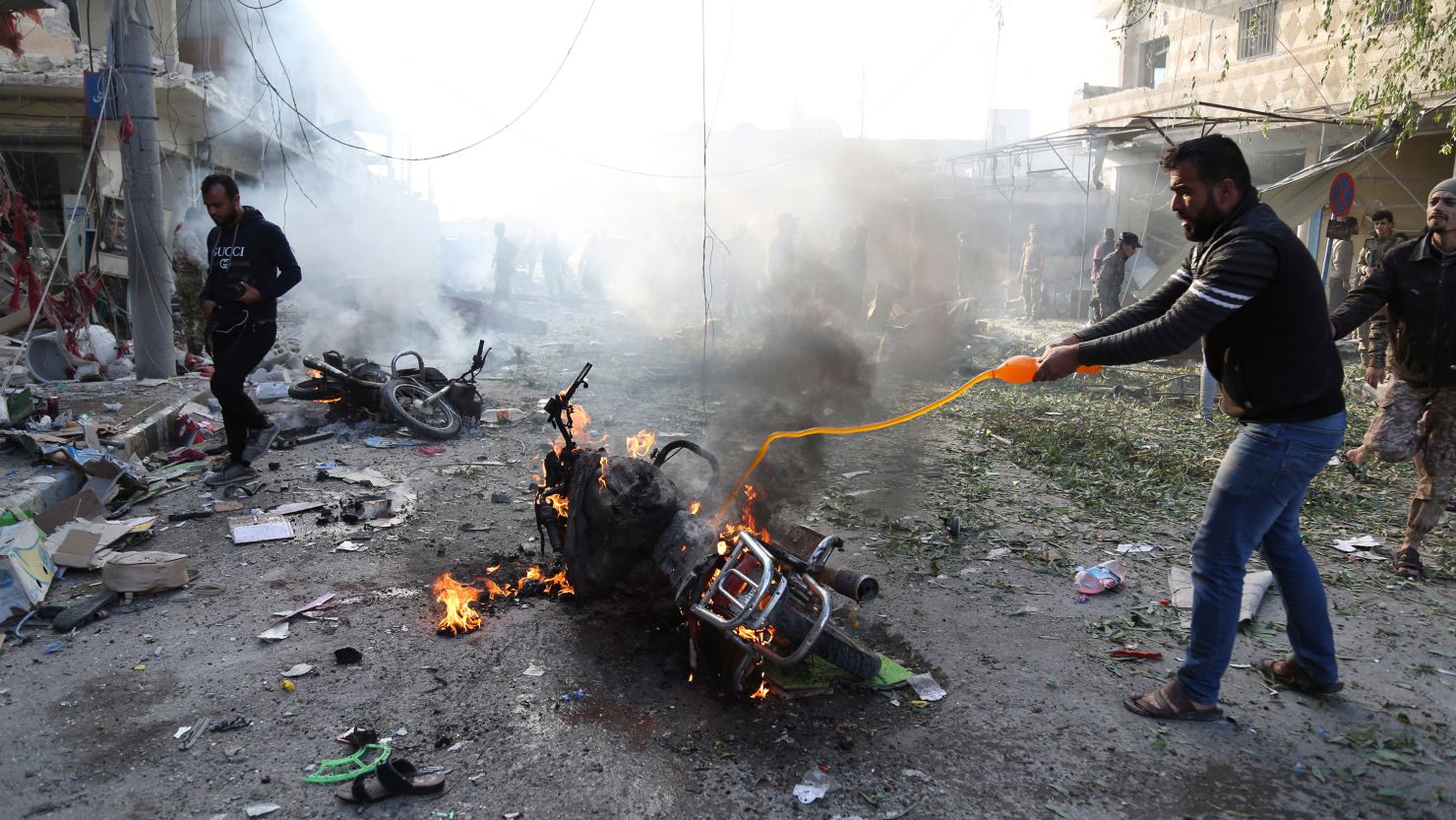 A car bomb exploded in the northern Syrian town of Tal Abyad, killing at least 13 people. 
